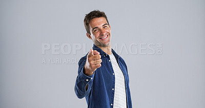 Buy stock photo Portrait, pointing to you and man in studio, smile and choice with confidence on white background. Face, happy person and model with hand gesture, opportunity and decision with sign up and selection