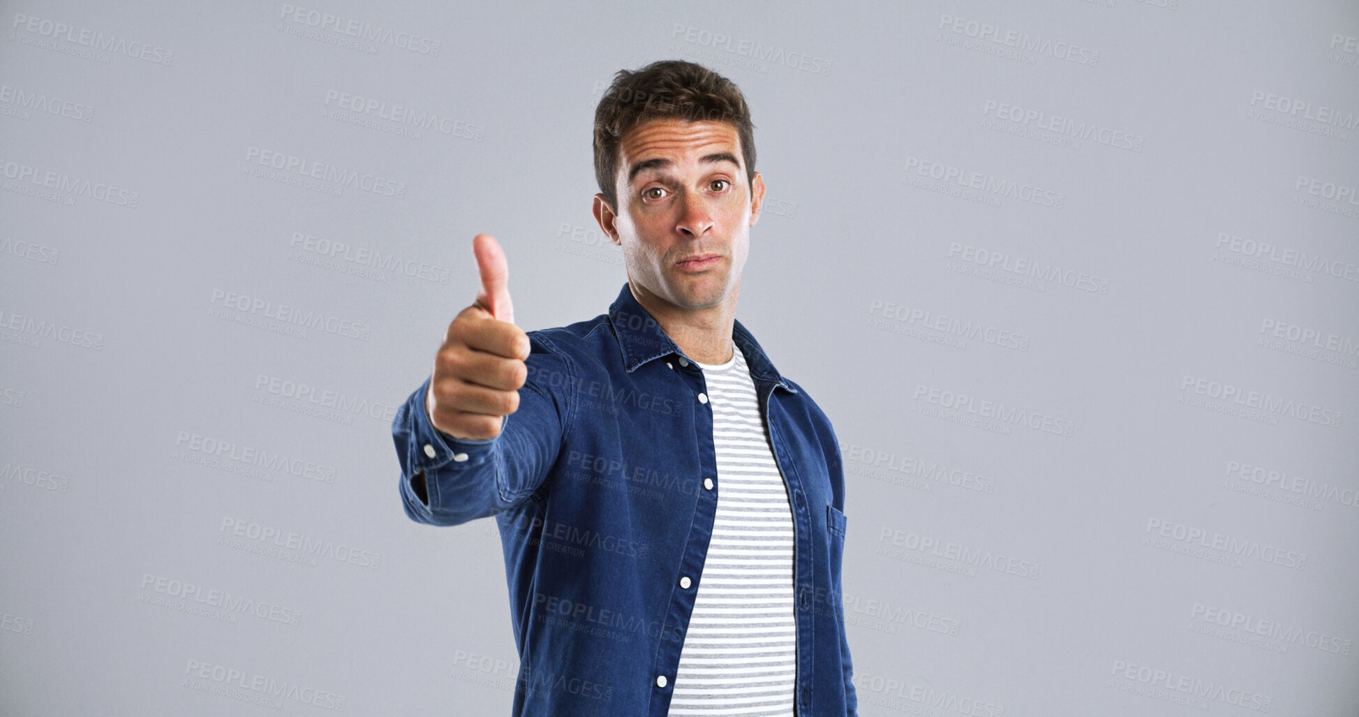 Buy stock photo Man, portrait or thumbs up in studio for okay, good job or well done on a white background. Male person, model or hand gesture with like emoji or yes sign for thank you or agreement on mockup space