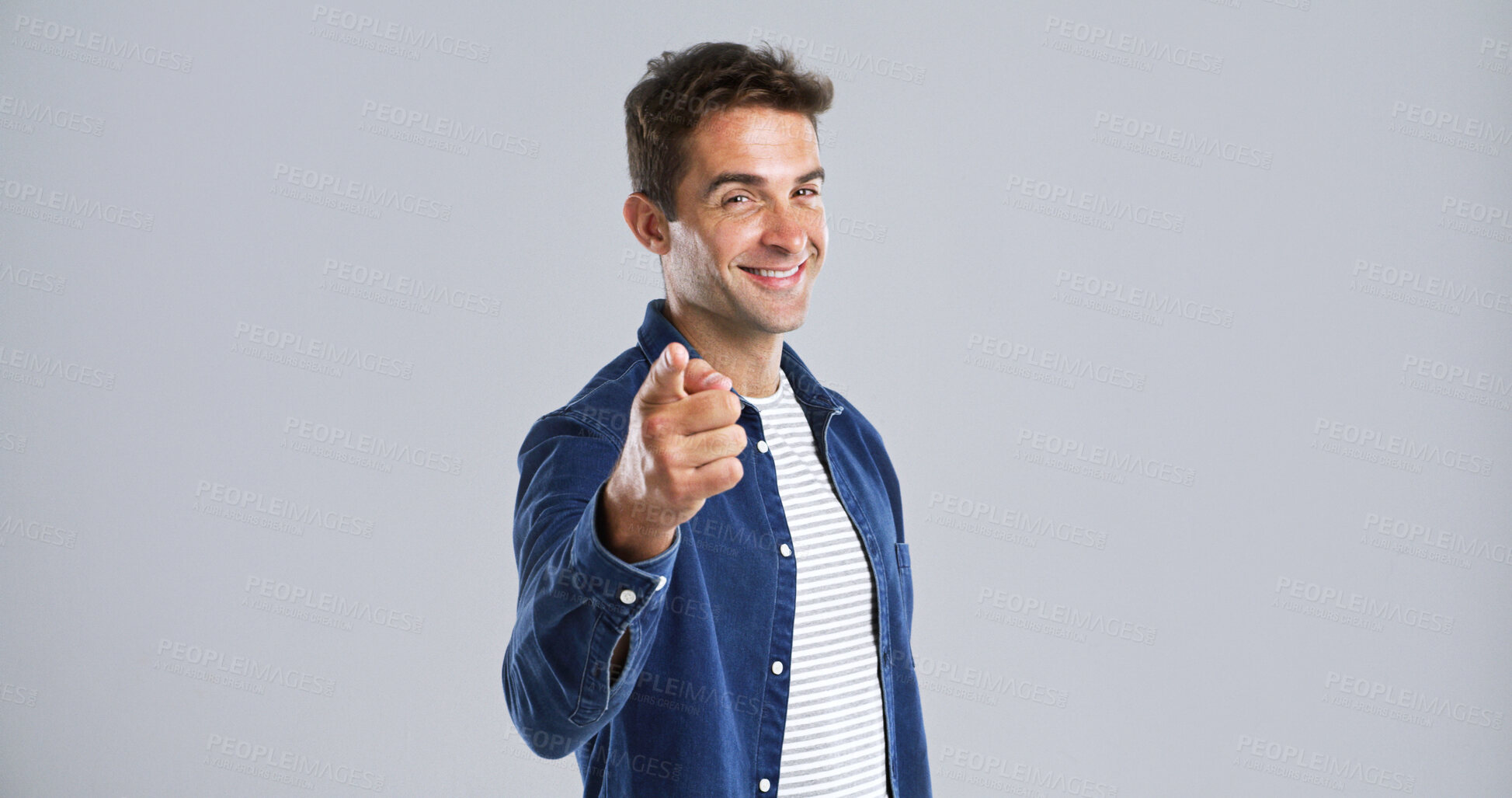 Buy stock photo Portrait, pointing to you and man with smile, choice and confidence on white studio background. Face, happy person or model with gesture, opportunity or decision with sign up, motivation or selection
