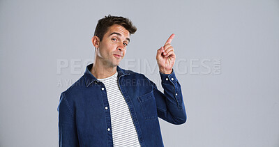 Buy stock photo Pointing, portrait and man in studio, opportunity and announcement on white background. Person, mockup space and model with hand gesture, promotion and discount deal with sales, decision or solution