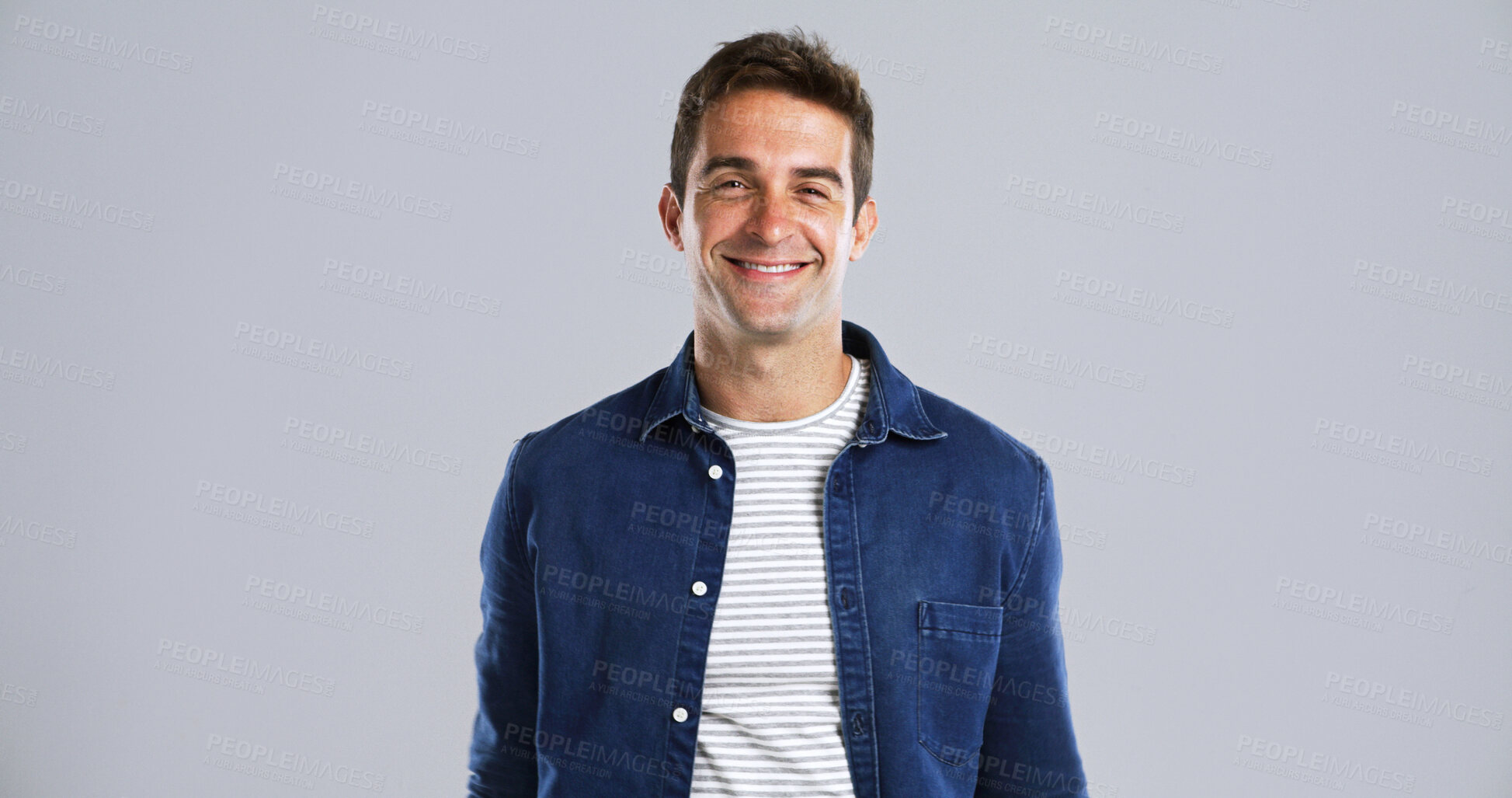 Buy stock photo Denim, fashion and man in portrait with smile, mockup space and white background. Happy model, studio or creative person with cool outfit, trendy style or modern clothes in Canada for satisfaction