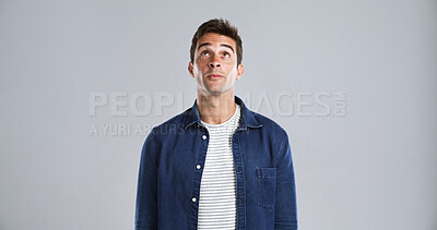 Buy stock photo Man, thinking and curious for choice in studio for waiting, announcement and feedback. Mockup space, person and anticipation for competition, winner and news for giveaway results on white background