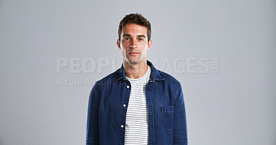 Buy stock photo Man, portrait and casual fashion in studio with confidence, trendy style and pride in shirt on white background. Student person, model and face with cool outfit, clothes and calm with mock up space
