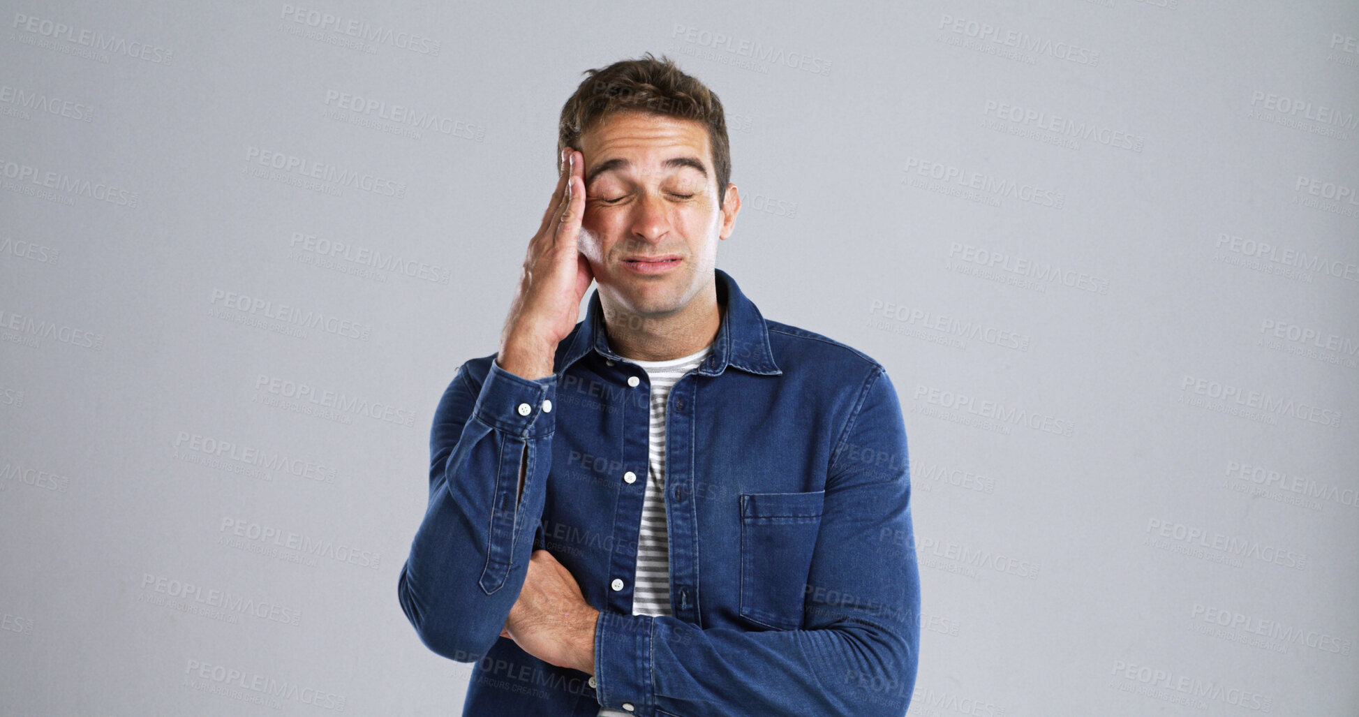 Buy stock photo Tired, man and pain with headache in studio from stress, vertigo and burnout from pressure. Mockup space, person or fatigue with migraine, muscle tension or brain fog with mistake on white background