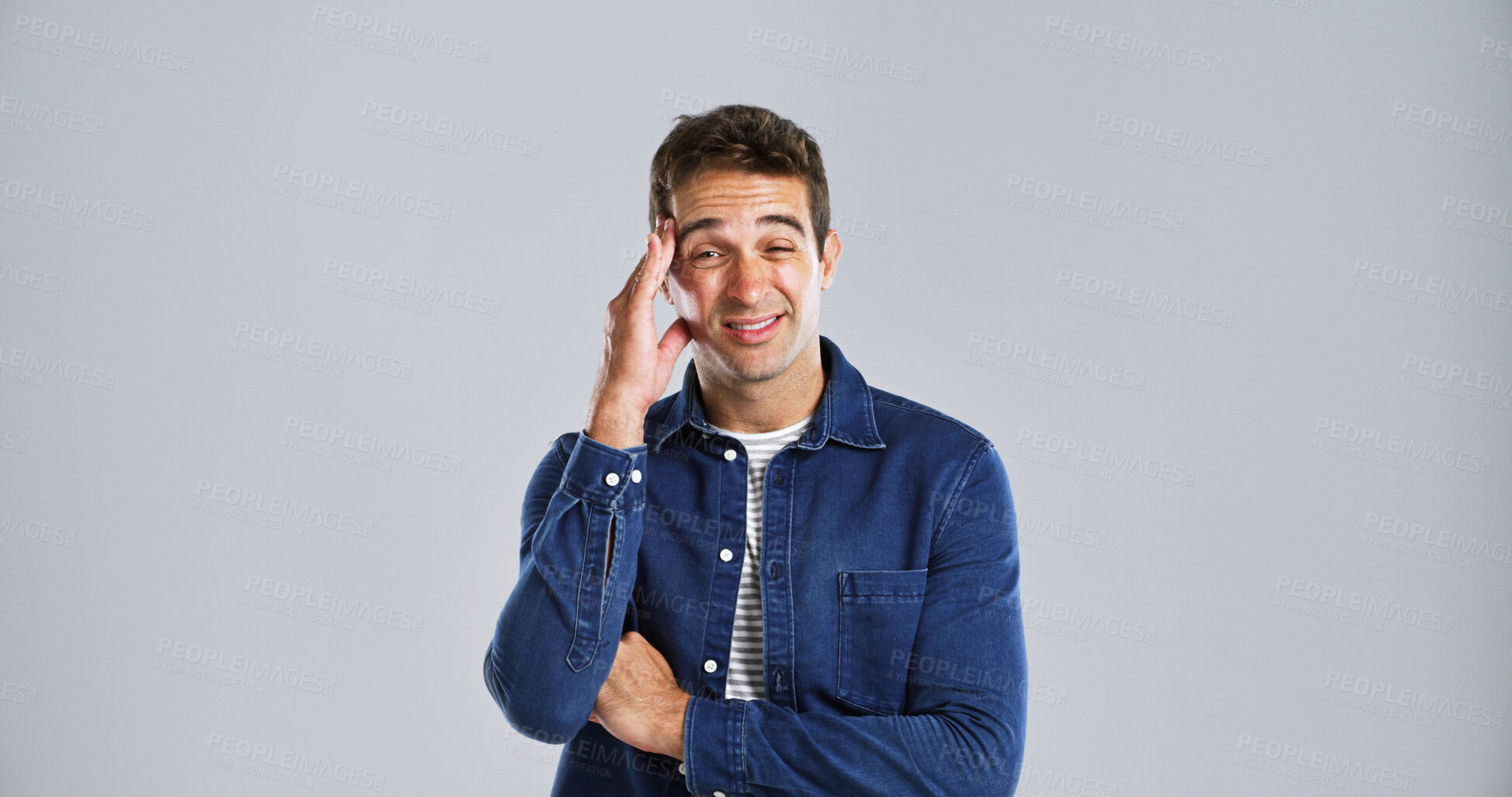 Buy stock photo Portrait, headache and man in studio, pain and stress with muscle tension on gray background. Face, person and model with migraine, burnout and mental health with pressure, frustrated and anxiety