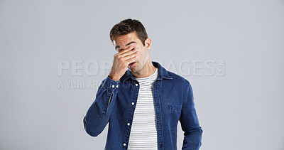 Buy stock photo Man, headache and stress with eye strain in studio with fatigue, vertigo and frustrated by background. Person, tired and migraine with pain, exhausted and burnout with mockup space for vision