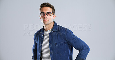 Buy stock photo Glasses, serious and portrait of man in studio with confidence for IT career with vision. Spectacles, mockup space and face of male person from London with pride for tech job by white background.