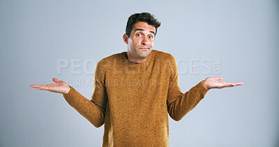 Buy stock photo Portrait, shrugging and question with man in studio for doubt, problem solving or solution. Emoji, hand gesture and uncertain with confused person on white background for answer, decision or mistake