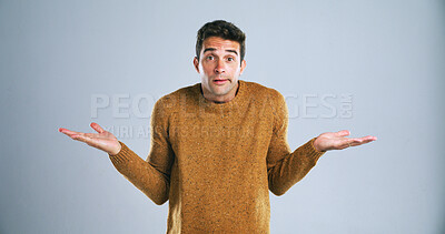 Buy stock photo Confused, portrait and shrugging with man in studio for doubt, problem solving or question. Emoji, hand gesture and solution with unsure person on white background for answer, decision or mistake