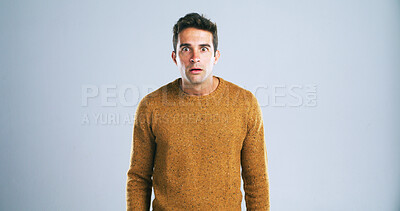 Buy stock photo Portrait, man and surprise in studio for deal news, drama and panic reaction for danger risk. Mockup space, person and shocked expression for horror story, scary rumor and terror on white background