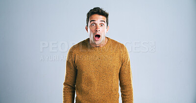 Buy stock photo Portrait, man and shocked with fear in studio for bad news, drama and reaction to danger risk. Mockup space, person and surprise expression to horror story, scary rumor and terror on white background