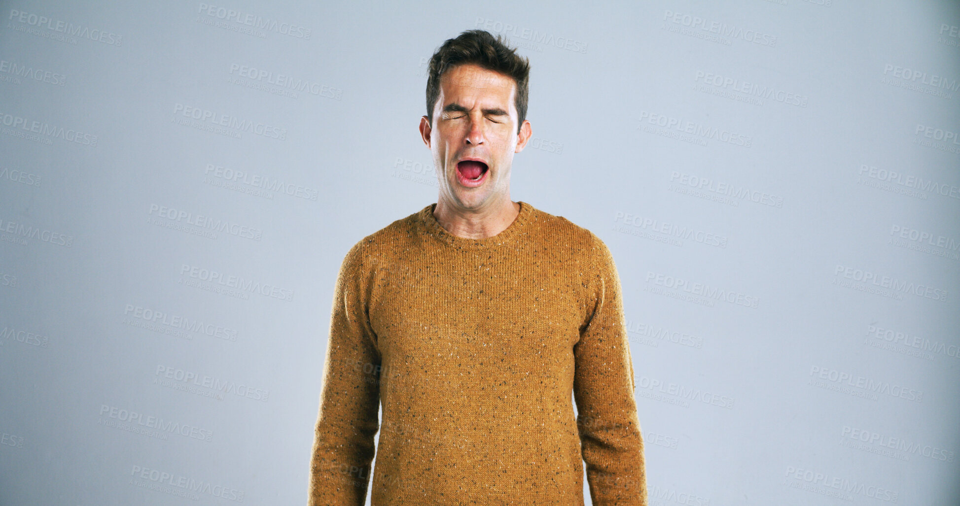 Buy stock photo Face, yawn and tired man in studio with burnout, low energy or exhausted on white background. Fatigue, sleepless and male model with insomnia expression for sleepy emoji, lazy or bored gesture
