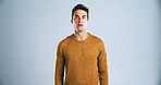 Portrait, man and shocked with reaction in studio for sale news, drama and gossip of winner. Mockup space, person and surprise expression for story, hearing rumor and announcement on gray background