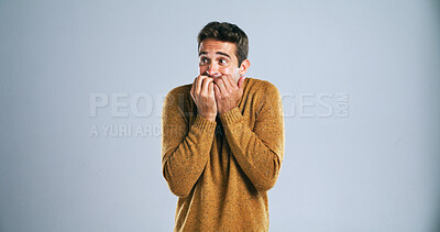 Buy stock photo Nervous, scared and worried with man on studio mockup for fear, nightmares or ptsd from trauma. Anxiety, concern or stress with terrified person on white background for danger, panic or phobia