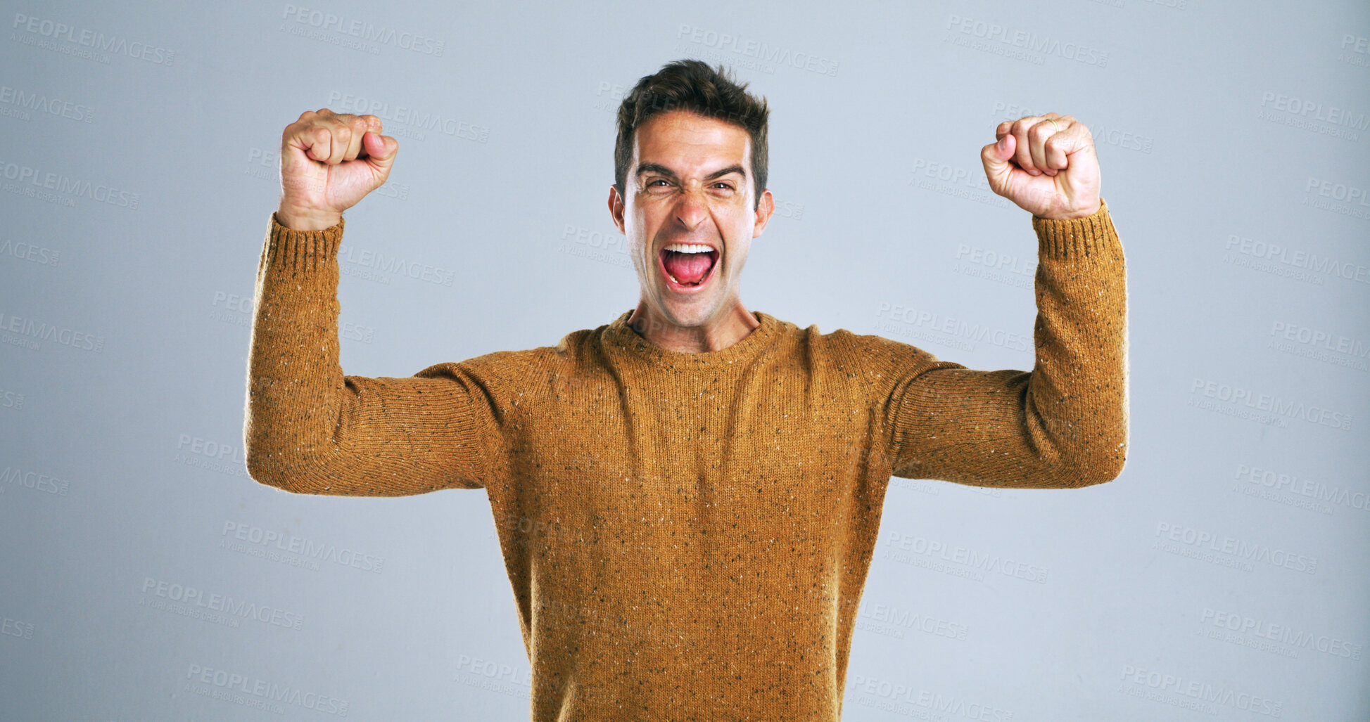 Buy stock photo Man, scream and fist pump in studio portrait with celebration, success and goals by background. Person, winner and excited with smile, shout and competition with giveaway, cheers and profit in Spain