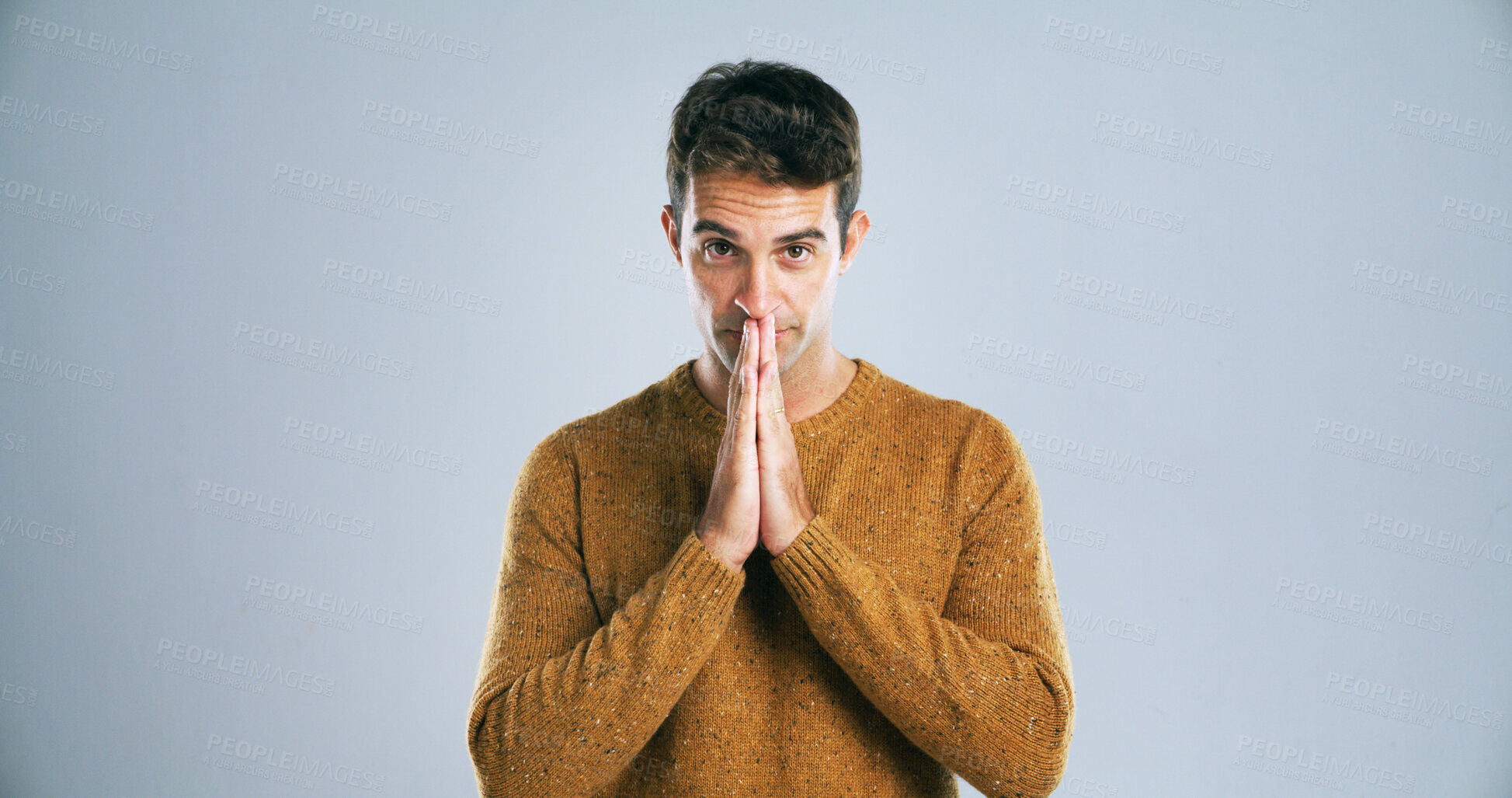 Buy stock photo Man, prayer and hope for worship with faith in God, healing or calm on white background. Spiritual, guidance and religion with portrait in studio for trust, opportunity and question for gratitude