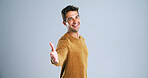 Happy man, portrait and studio with handshake for introduction or welcome on a white background. Male person, model or shaking hands with smile for greeting, thank you or meeting on mockup space