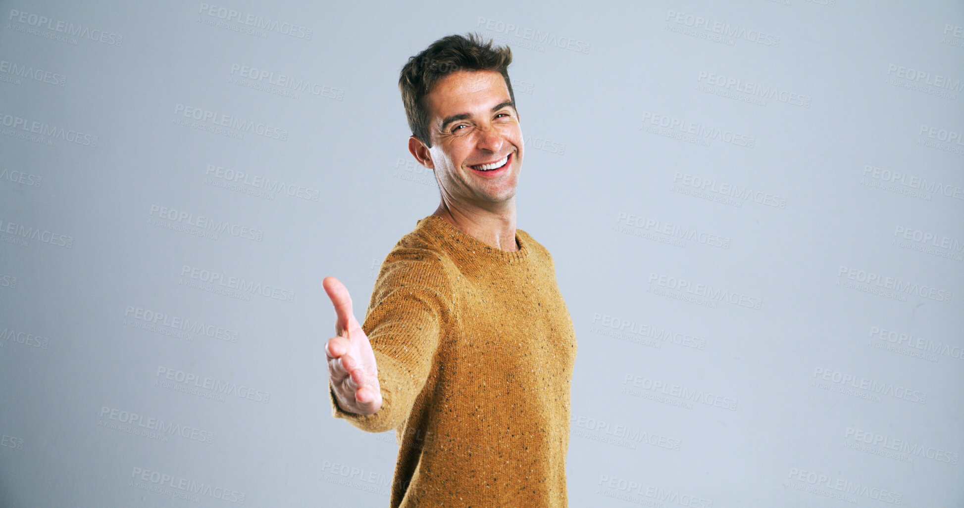 Buy stock photo Happy man, portrait and studio with handshake for introduction or welcome on a white background. Male person, model or shaking hands with smile for greeting, thank you or meeting on mockup space