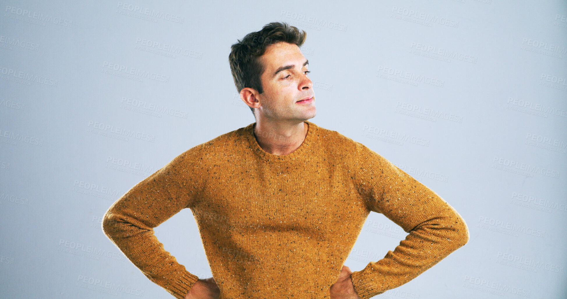 Buy stock photo Thinking, man and disappointed for fashion in studio with winter jersey, casual clothes and bad news. Mockup space, thoughts and person with arms on hips for mistake, outfit fail and white background