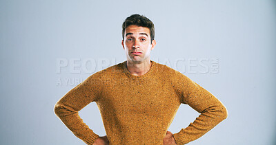 Buy stock photo Studio, man or bored in portrait with serious expression, emoji reaction or fashion with exhaustion. Mockup space, male person or model in white background for staring, casual style or hands on waist
