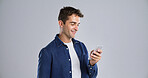 Man, smartphone and check notification for communication, social media or email for connection. Mockup space, mobile app and male person with reading message, texting or blog on white background
