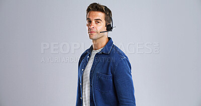 Buy stock photo Portrait, man and call center agent in studio with communication, contact us and CRM. Mockup space, help desk or inbound with customer service, consultant and headset for advice on white background
