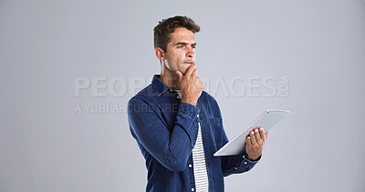 Buy stock photo Search, tablet and man with thinking in studio for app decision, game download and planning. Mockup, confused user and digital tech on white background for website update, connection fail or solution