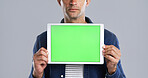 Man, hands and tablet with green screen for marketing, presentation or show on a white background. Male person, model or advertising with technology display or chromakey for app on mockup space
