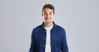 Buy stock photo Happy, goofy and portrait of man in studio with funny, comic or crazy facial expression. Mockup space, silly and male person from London with smile, joke or playful reaction by white background.