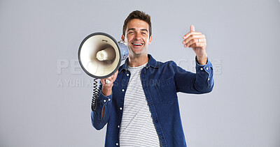Buy stock photo Happy man, portrait and megaphone with announcement in studio for sign up on a white background. Male person, gesture or promoter with smile, bullhorn or loudspeaker for alert or attention on space
