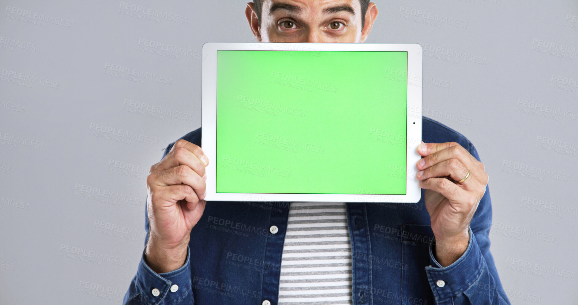 Buy stock photo Man, hands and tablet with green screen in portrait for advertising on a white background. Male person, user or marketing with technology display, UI or UX for software or new app on chromakey space