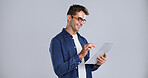 Glasses, smile and tablet with man in studio for programming or software development career. App, intelligence and web maintenance with happy tech guru on white background for professional IT support