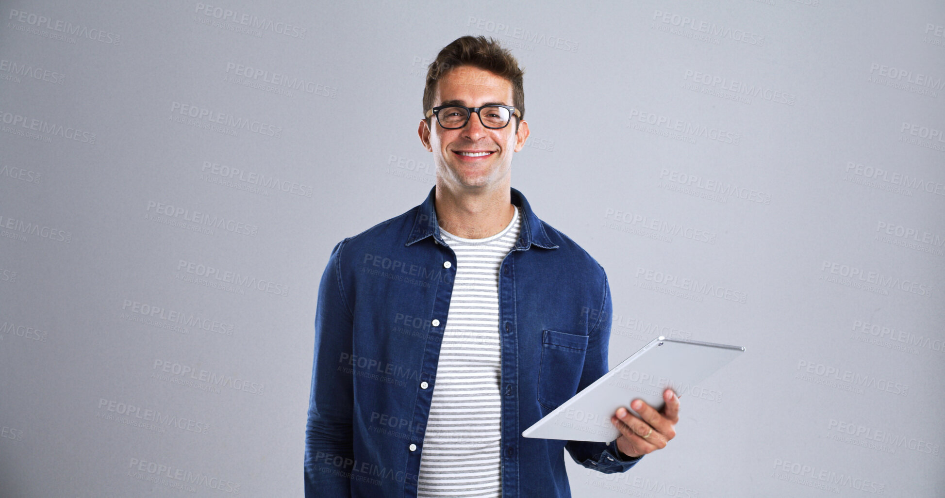 Buy stock photo Tablet, man and smile with portrait in studio for social media, internet and website app. Happy, male model and isolated on white background with technology for digital networking, e book or research