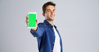 Buy stock photo Happy man, portrait and phone with green screen for presentation on a white background. Male person, model or showing with technology display or chromakey for new app or marketing on mockup space