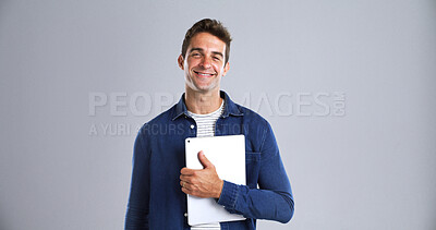 Buy stock photo Portrait, smile and man with tablet in studio for about us, career pride and creative writing. Mockup space, happy and author with digital for article, blog and publishing story on white background