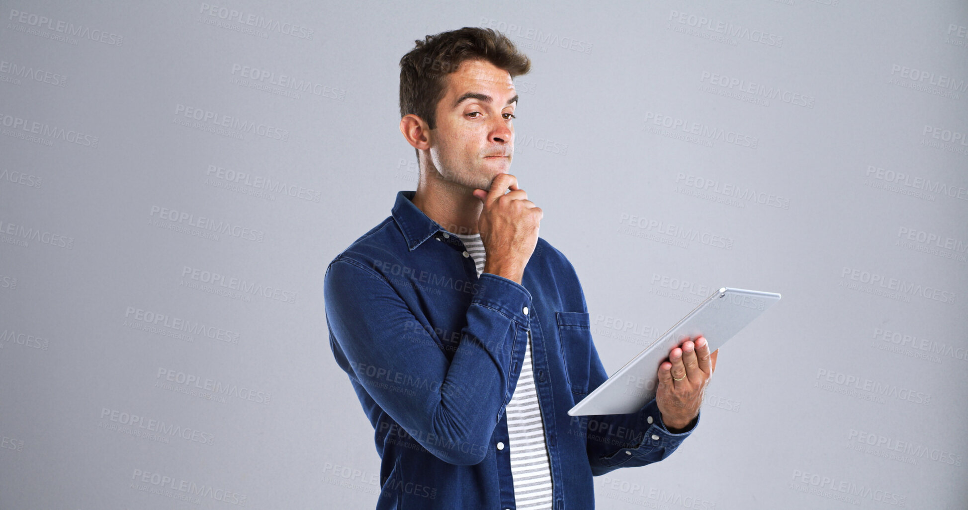 Buy stock photo Man, thinking and tablet for connection solution, IT problem solving and ideas for digital technology. Internet, network and pondering for website troubleshooting on mockup space on white background