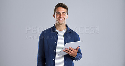 Buy stock photo Portrait, smile and tablet with man in studio for programming or software development career. App, system and web maintenance with happy tech guru on white background for professional IT support