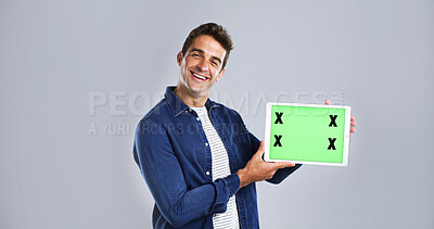 Buy stock photo Green screen, tablet and portrait of man in studio for research, networking or social media. Happy, digital technology and male person with communication, email or contact by white background.