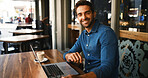 Laptop, portrait and remote work with happy man in coffee shop for research on small business startup. Computer, schedule and website with smile of freelance employee in restaurant as customer