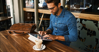 Buy stock photo Business, man and typing on tablet at cafe for online research, coffee break and remote work. Freelancer, person and scroll on digital tech at bistro for networking, calendar app and check schedule