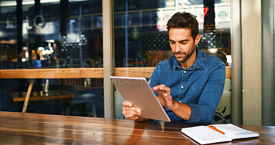 Buy stock photo Remote work, man or typing with tablet at cafe for creative research, article submission and email. Freelancer, journalist and digital app at restaurant for proofreading story, blog review or editing