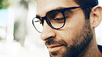 Online, glasses and reading with man in city for eye care, research and vision health. Prescription lenses, optical frames and ophthalmology with person outdoor for spectacles, space and planning