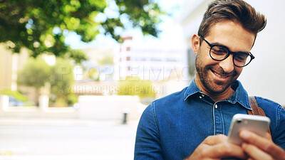 Buy stock photo Happy man, city and chatting with phone for travel, commute or outdoor communication. Male person, traveler or creative employee with smile on mobile smartphone for online texting app in urban space