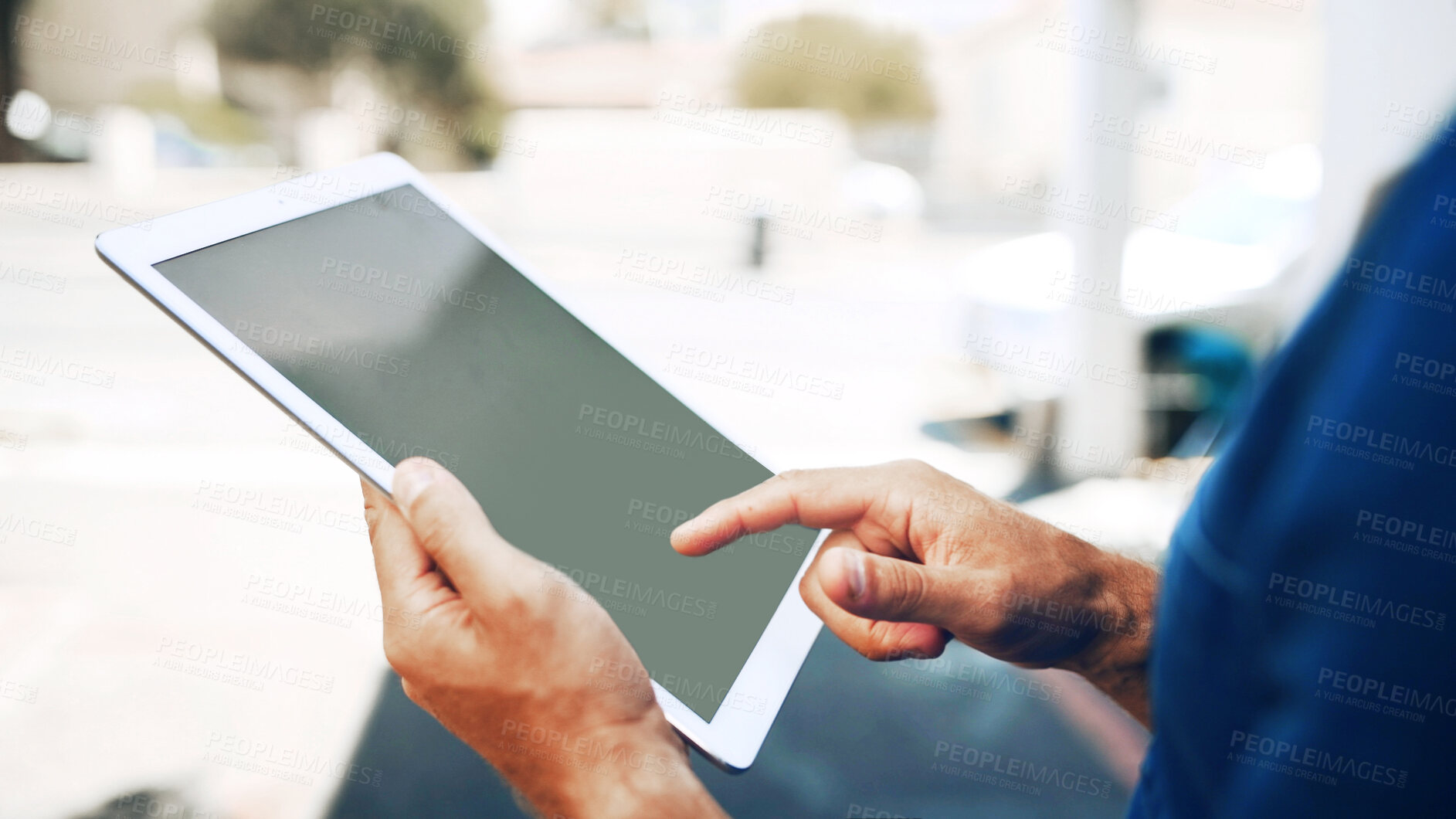 Buy stock photo Tablet screen, hands and person in city for travel, navigation app or search destination online. Tech display, closeup and man outdoor for chat, text location or typing message on street with space