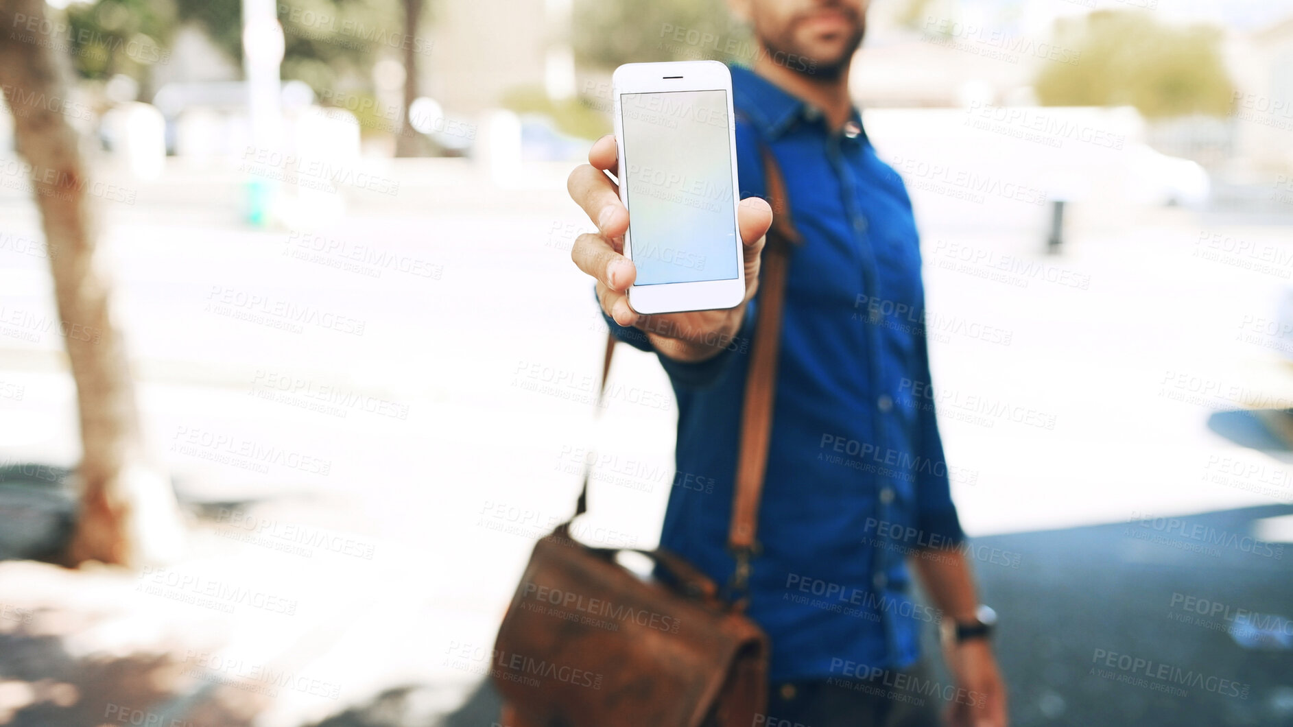 Buy stock photo Mockup space, phone screen and man outdoor in city for networking, communication or connectivity. Technology, research and male person with cellphone for texting, contact or social media in town.