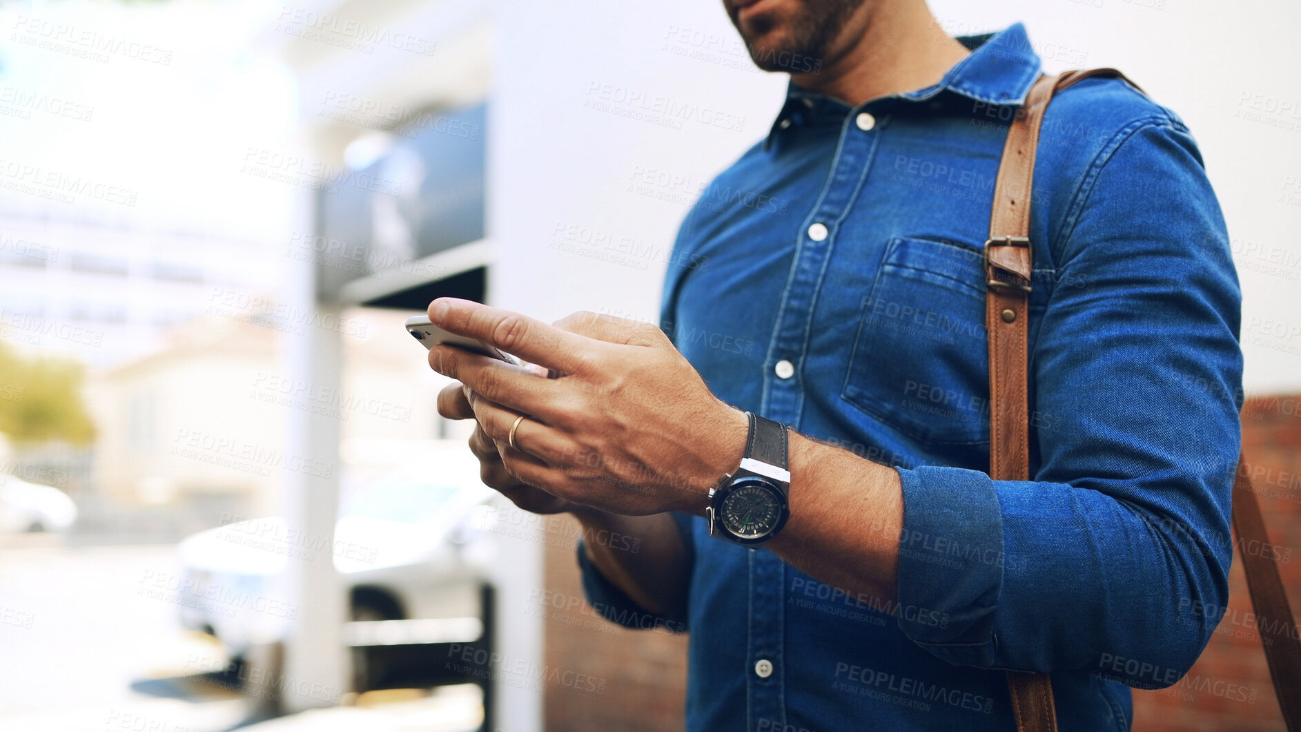 Buy stock photo Phone, hands and businessman outdoor in city on mobile app for booking ride in morning. Cellphone, contact and male person with research for location directions with commute to work in urban town.
