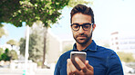 Man, reading and phone in city for travel, networking and taxi app for ride booking. Creative professional, person and commute with smartphone outdoor for text notification or social media scroll