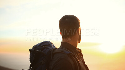 Buy stock photo Man, hiking and ocean view at sunset for adventure, sky or backpack in nature in summer. Person, perspective and sightseeing by sea, mountain summit or cliff with trekking, outdoor or space in Greece