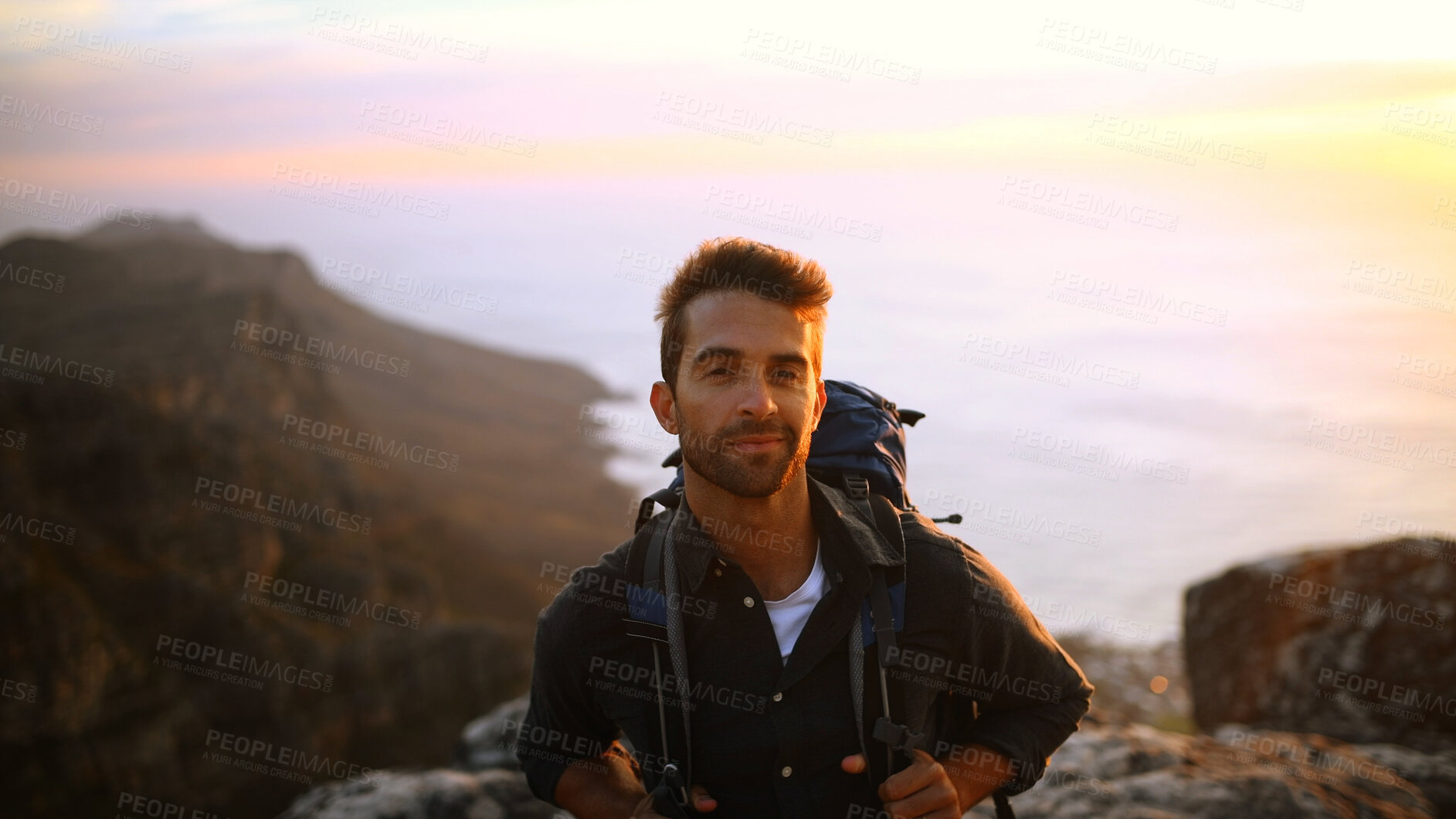 Buy stock photo Hiking, smile and man with portrait outdoor for travel adventure, sightseeing and holiday trip. Sunrise, happy and person with backpack for trekking break, backpacker journey and relax at destination