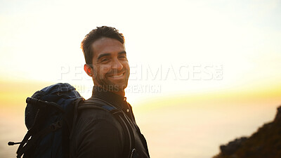 Buy stock photo Hiking, sunrise and man with portrait on mountain for travel adventure, sightseeing and explore. Space, happy and person with backpack for trekking break, backpacker journey and relax at destination